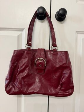 Coach Burgundy SOHO Shoulder Bag, Double Handles, Buckle Closure, Hang Tag Coach